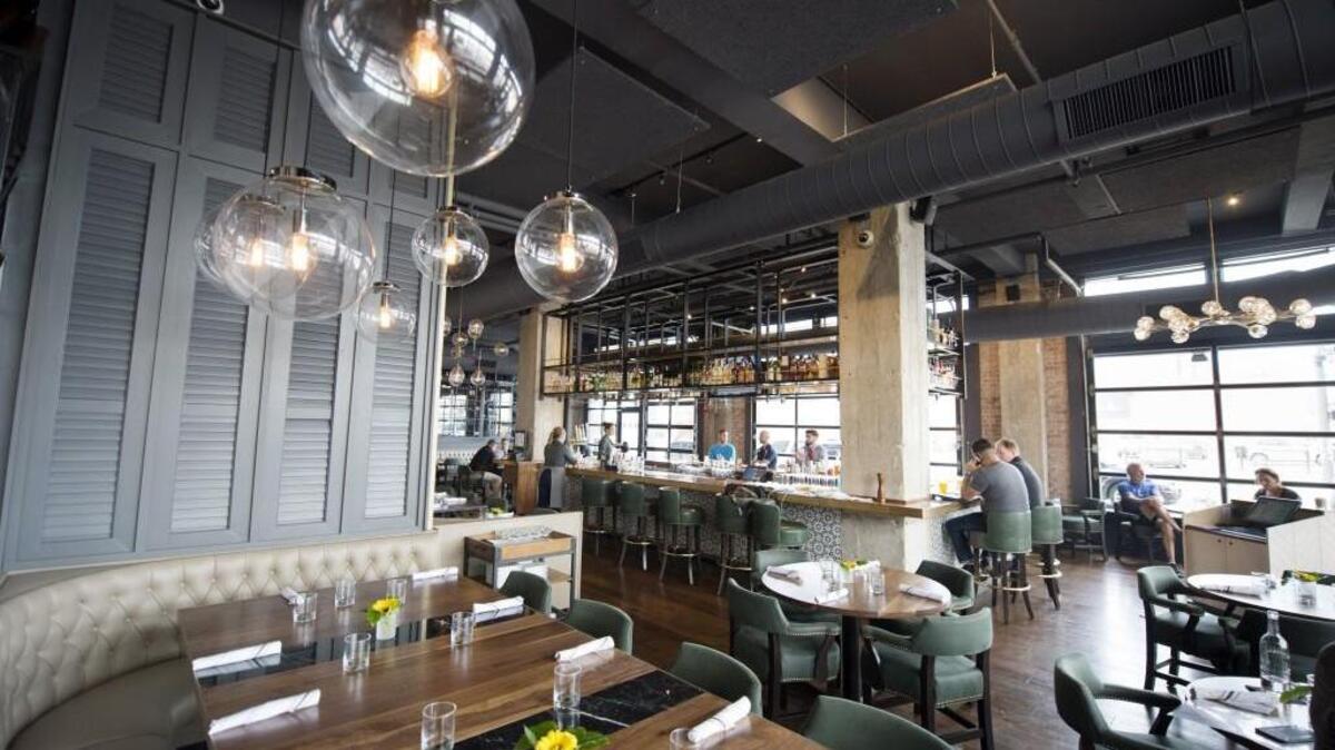 The Rockhill Grille boasts stylish decor, a central bar and floor-to-ceiling windows with views of downtown Kansas City.