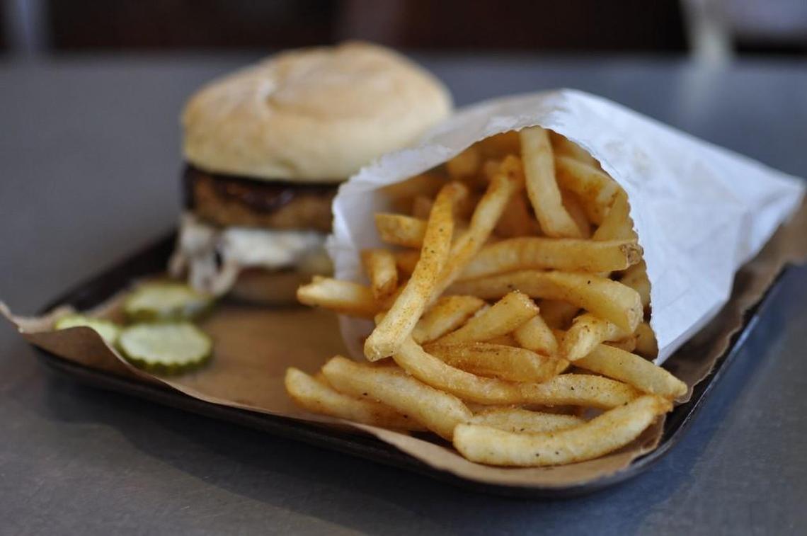 Joe’s Kansas City’s skin-on seasoned fries are its most popular side.