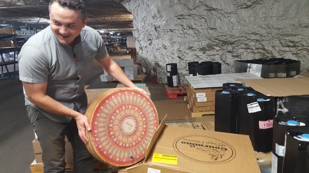 In the underground of Hunt Midwest’s SubTropolis, Ben Hathaway of Paris Brothers Specialty Foods recently showed off a 70-pound wheel of cave-aged Swiss Gruyere cheese stored at the company’s limestone warehouse.