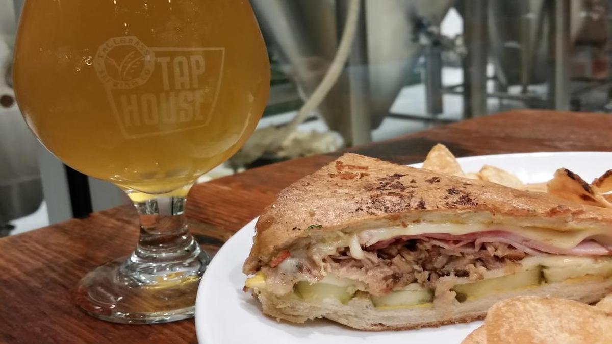 
Wash down Tallgrass Tap House’s porkbelly Cuban sandwich with a cold Farmhand, a small batch saison beer. 
