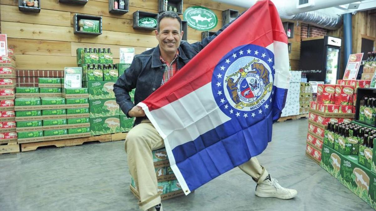 Dogfish Head founder and CEO Sam Calagione waved a Missouri state flag after the Delaware brewery announced it would start distribution in the Show Me State. Dogfish Head beer is now available in 34 states and Washington, D.C., and is adding more states in 2017.