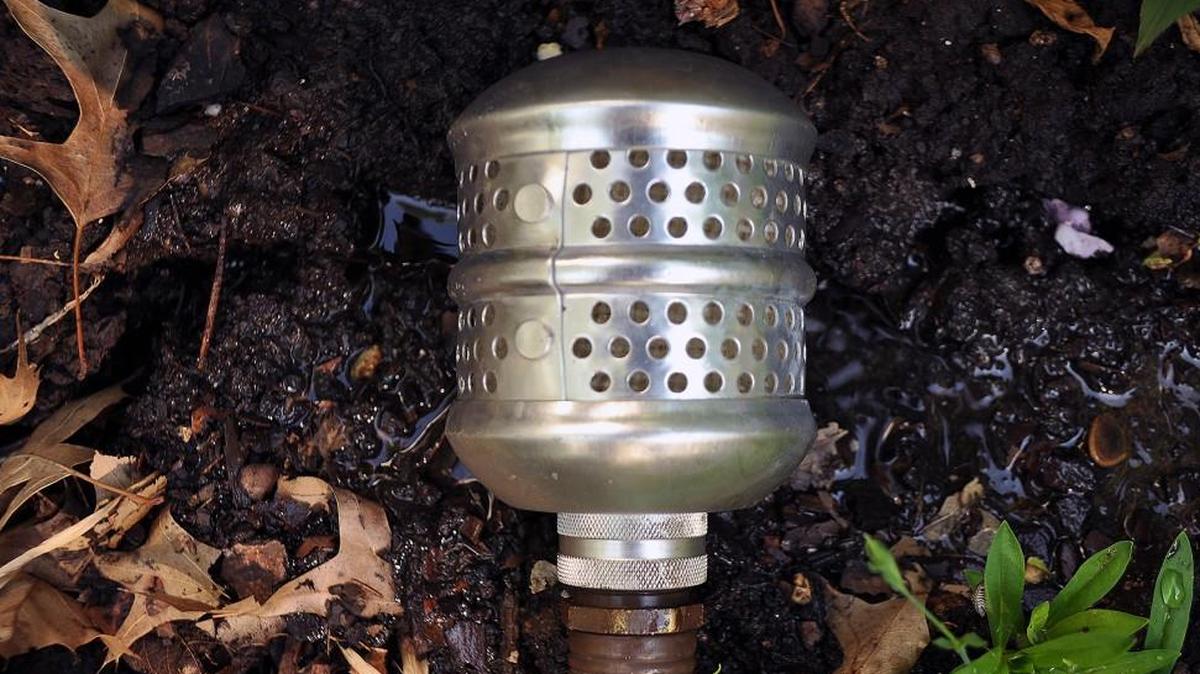 A bubbler can help slowly soak the ground under trees and shrubs.