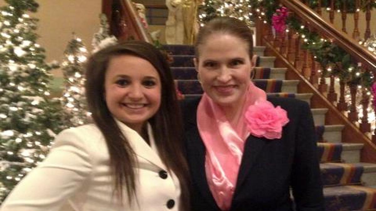 
Communications professor LisaMarie Luccioni (right) is all about proper holiday manners. She offers an “Evening of Etiquette” for students, including Lizzy Dinevski, in Cincinnati.
