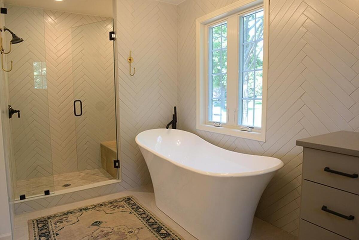 The master bathroom also has a glass walk-in shower.