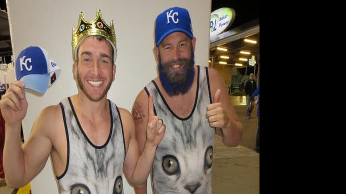 Mee-owww! Motivational speaker Paul Long, 33 (left), of Lenexa and John Stoner, 34, of Kansas City posed for lots of pictures in the crowd. They first wore their Blue Chip Wrestling singlets to a Royals-Yankees game to mock “classy cat” Derek Jeter. Jeter’s farewell tour “was so ridiculous that we wanted to out-troll him ... and then the Royals won two in a row, so what do you do? You keep wearing them,” said Stoner, an IT guy.