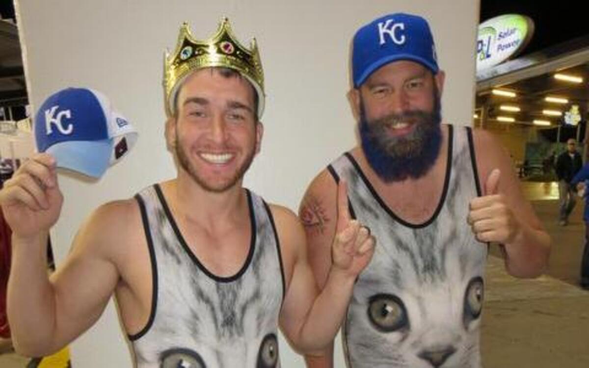 Mee-owww! Motivational speaker Paul Long, 33 (left), of Lenexa and John Stoner, 34, of Kansas City posed for lots of pictures in the crowd. They first wore their Blue Chip Wrestling singlets to a Royals-Yankees game to mock “classy cat” Derek Jeter. Jeter’s farewell tour “was so ridiculous that we wanted to out-troll him ... and then the Royals won two in a row, so what do you do? You keep wearing them,” said Stoner, an IT guy.