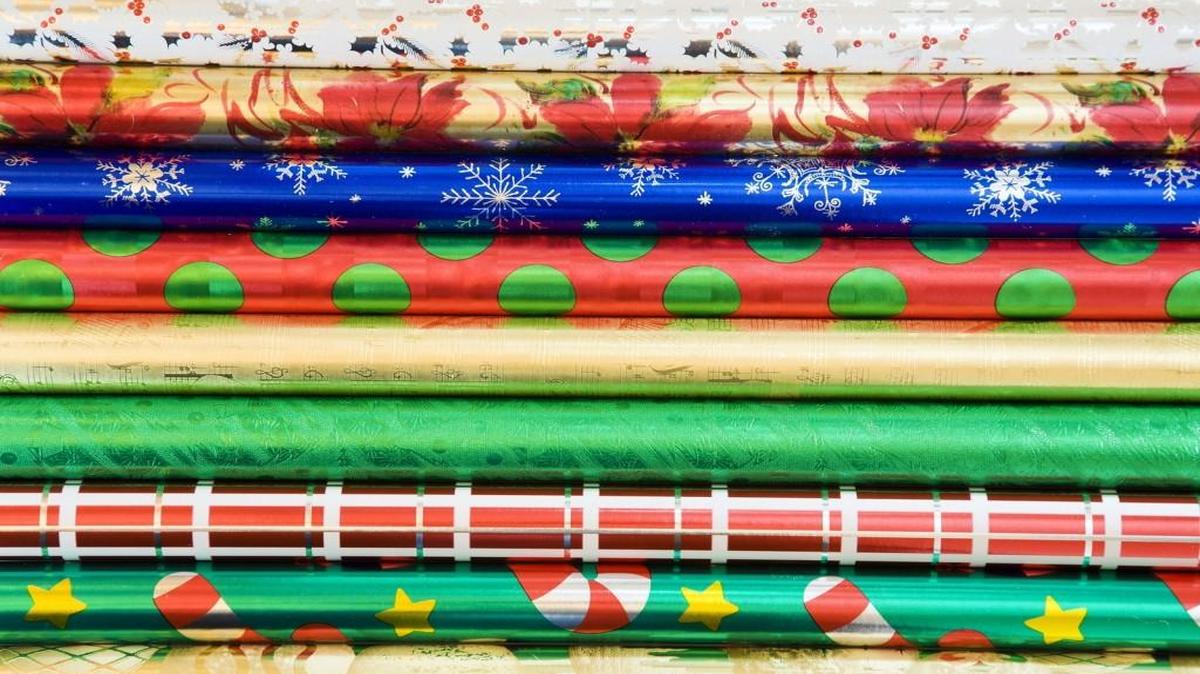 Kids artwork is so much cuter than rolls of commercial wrapping paper.
