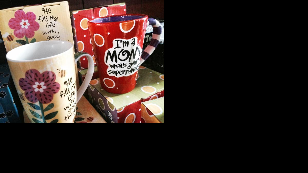 
A cup proclaims the superpowers of mothers 
