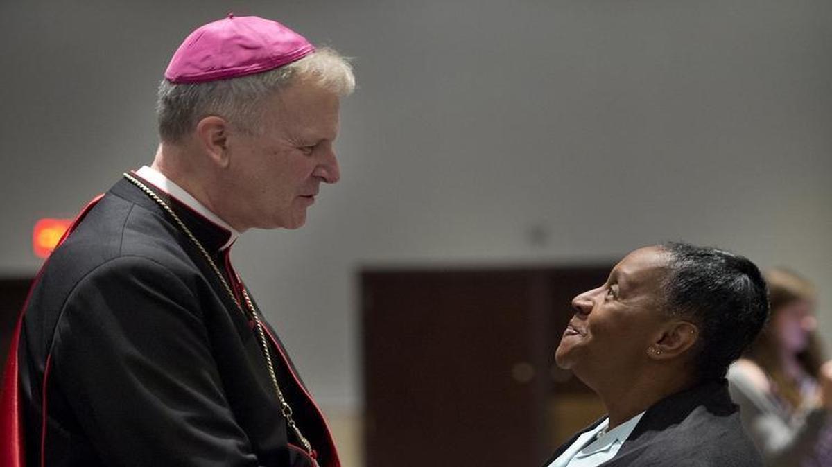 Dabora Minor of St. Mary’s Parish in St. Joseph greeted Bishop James V. Johnston Jr. at a reception Wednesday that followed his installation in the Diocese of Kansas City-St. Joseph.