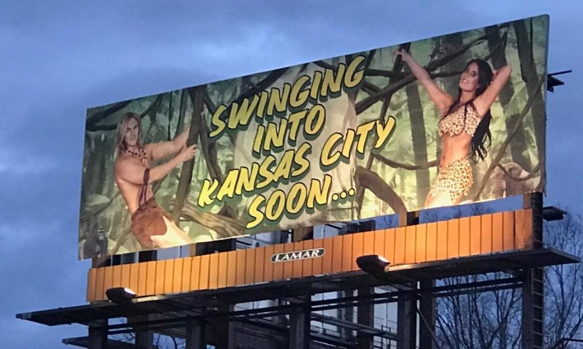 Engaged attorneys Tristen Woods (left) and Lauren Sierra Kruskall teased their move to Kansas City with Tarzan-style billboards for their firm, Jungle Law Group.