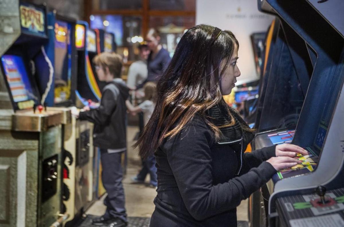 The Crossroads district includes businesses like Tapcade at Screenland Crossroads, which features a bar, a theater and an arcade.