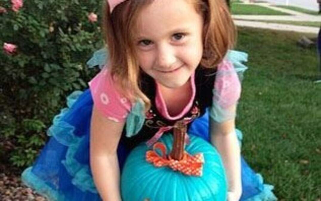 
Mia Taggart is supporting the Teal Pumpkin Project to raise awareness of food allergies around Halloween. A teal pumpkin in front of a house means there are nonfood goodies available, like stickers and glowsticks.
