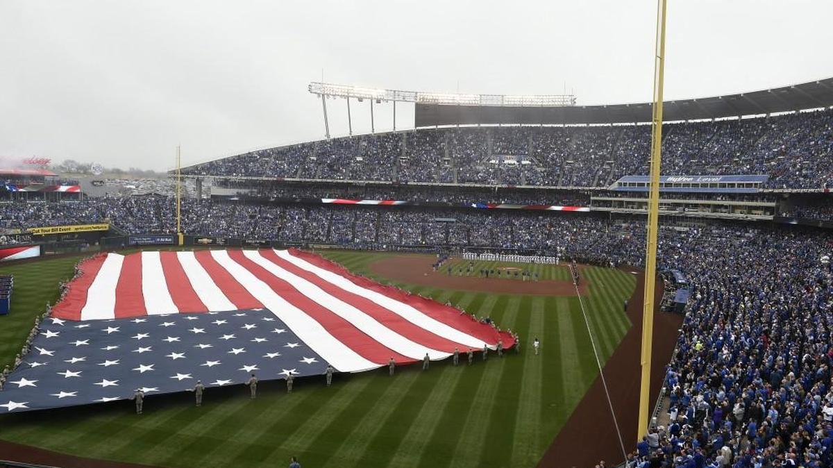 A giant American flag covers the Kauffman Stadium outfield for the national anthem every opening day.