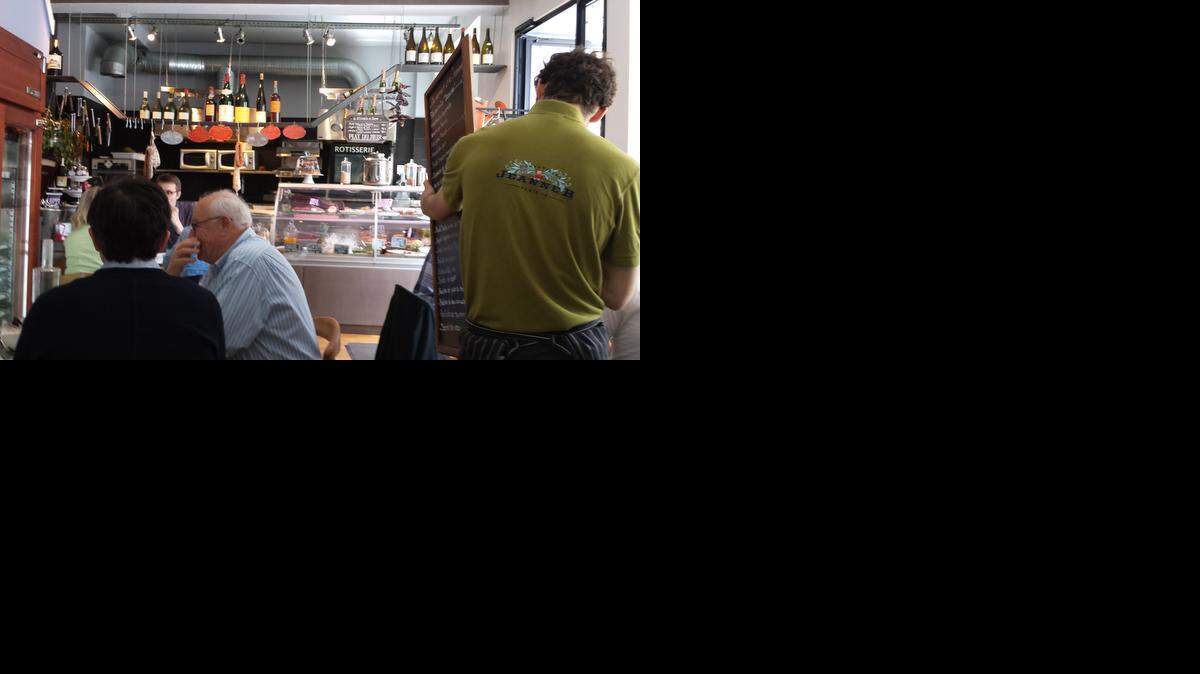 Jeanne B in Montmartre is both a grocery store and a restaurant that offers a deli counter, sit-down dining and a chalkboard menu.