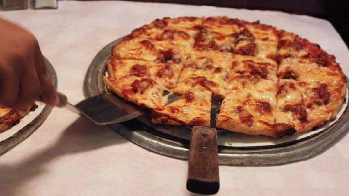 
Chicago is one of a handful of cities across the country, like Boston, Milwaukee and New York, with companies that offer tours of the local pizza scene. Those on a tour in Chicago got to sample this cheese and sausage pizza at Pizano’s in Chicago.
