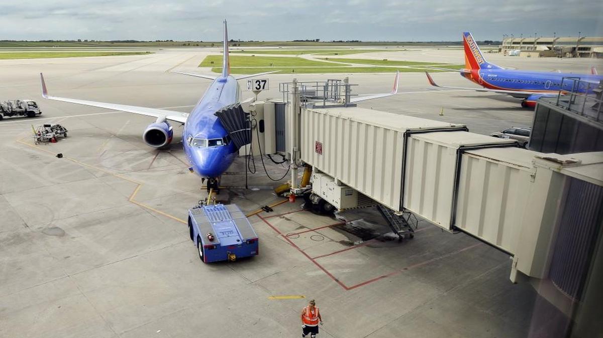 Southwest Airlines jets sit at their gates at Kansas City International Airport.