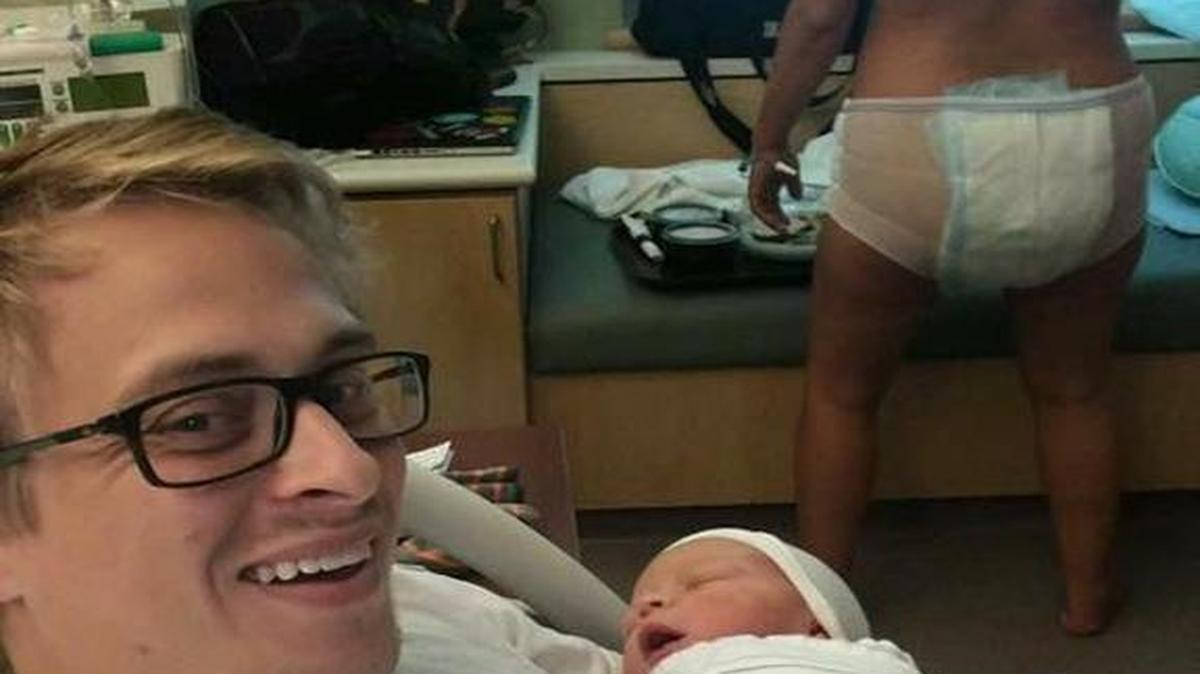 Amanda Bacon, who had a baby two weeks ago, posted this image of herself at the hospital to her Facebook page, setting off a flood of comments. Her husband took the photo, but she posted it.
