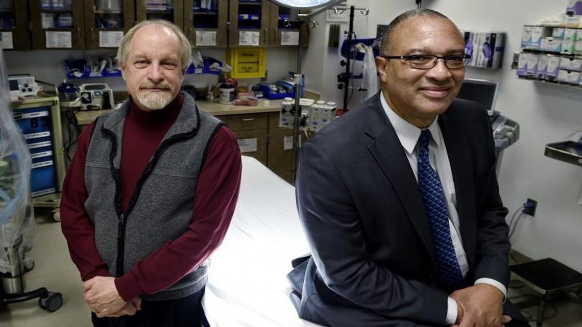 KU’s Center for Concussion Management offers a team of experts, including research coordinator Jeff Radel (left) and director Michael Moncure, to treat mild brain injuries. The center sees 300 to 500 patients a year, most a result of falls or vehicle and bike crashes.