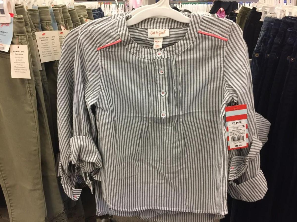For the little one who wants to look just like Mom (or maybe a cool teenage cousin), a gray pinstripe blouse with pink piping (Cat & Jack, $16.99) would look darling with skinny olive pants (Cat & Jack, $16.99).