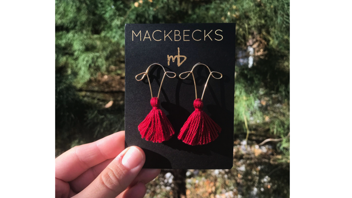 Kansas City jewelry maker melds activism, metalsmithing with uterus-shaped earrings