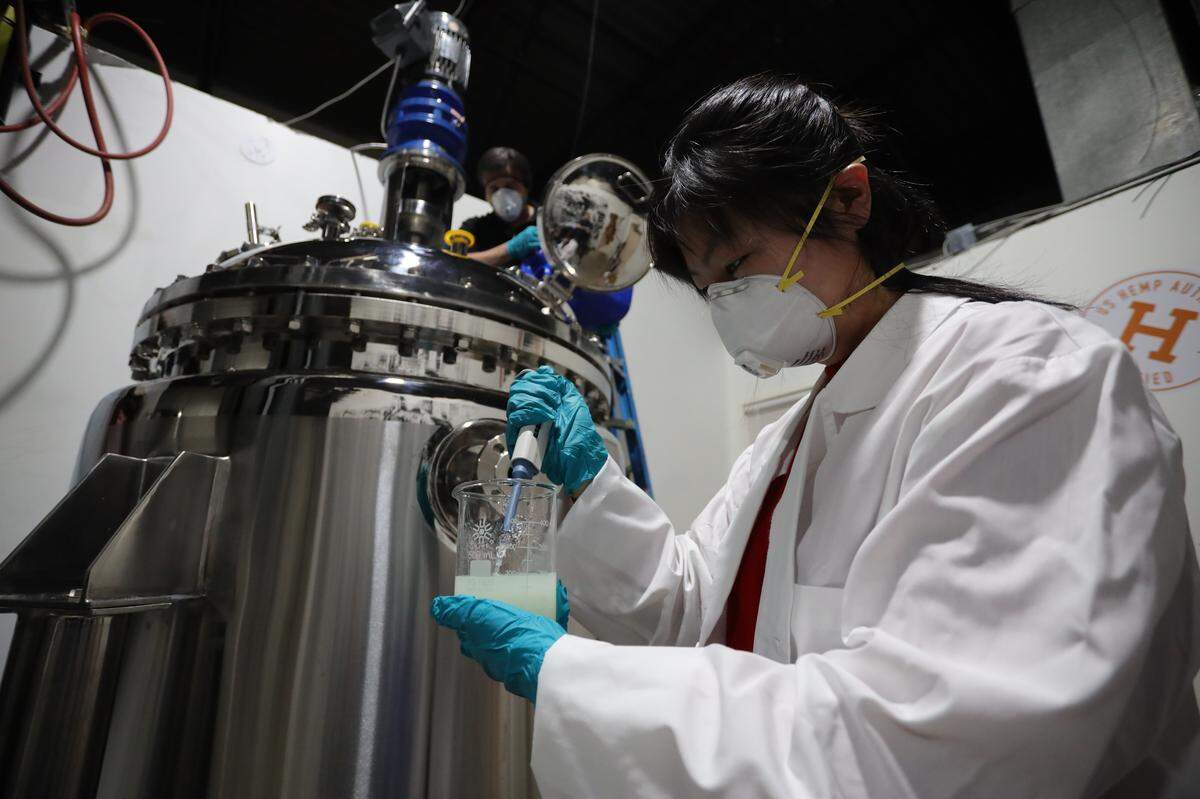 Preparing hand sanitizer in the labs at CBD American Shaman