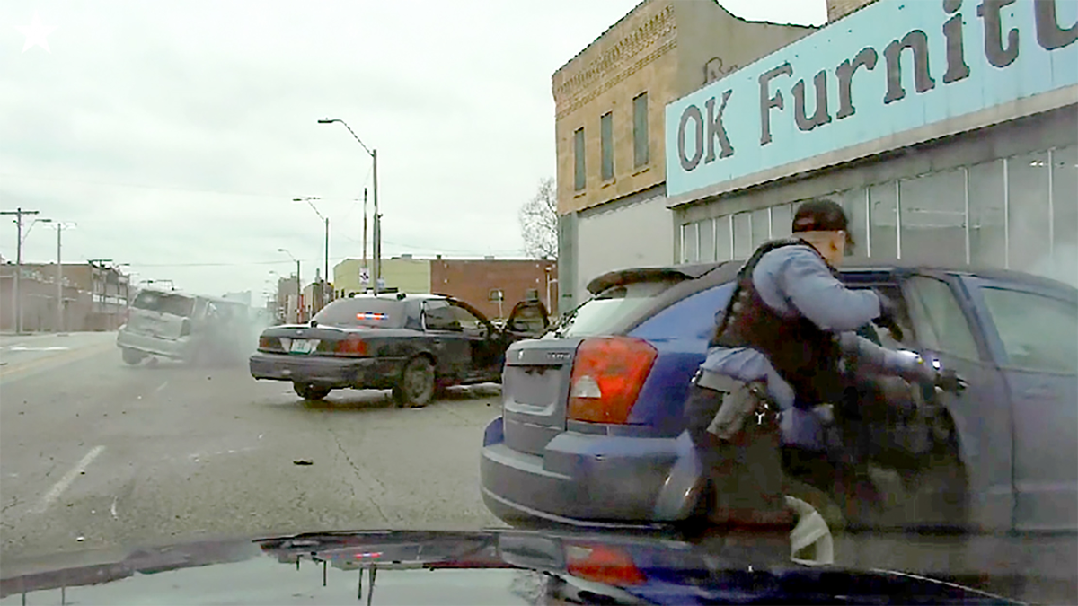 A still image from a dashcam video shows the aftermath of a 2022 Kansas City police chase that ended with a wreck. Erika Miller, a 38-year-old mother of seven, was killed as an innocent bystander.