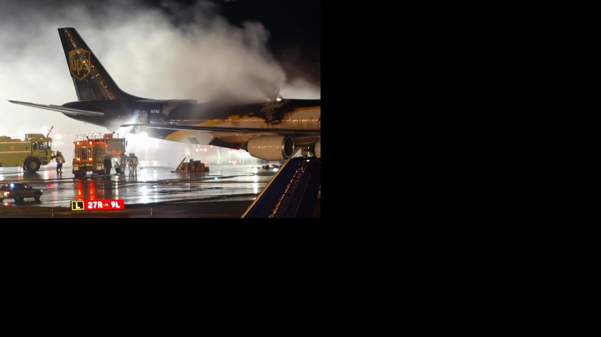 
Firefighters battle a blaze onboard a UPS cargo plane in 2006 at Philadelphia International Airport.
