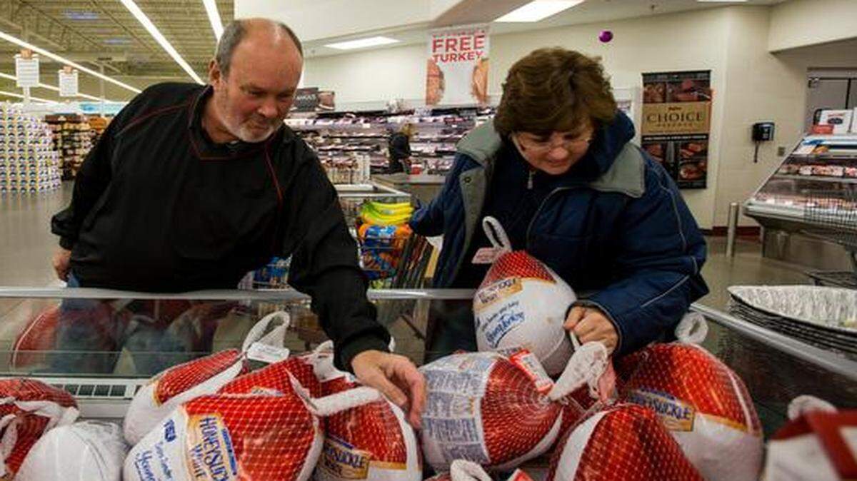 
Steve Robinson of Overland Park was among those shopping for a Thanksgiving turkey on Monday, as was Joni Kelsey, also of Overland Park. They were shopping at the HyVee at 8501 W. 95th St. in Overland Park.
