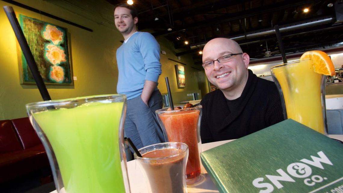 Andy Talbert (left) and Jerry Nevins are two of the three partners of Snow & Company. The owners announced in June they will move the frozen cocktail business from the Crossroads to Westport, partly because of liquor license issues.