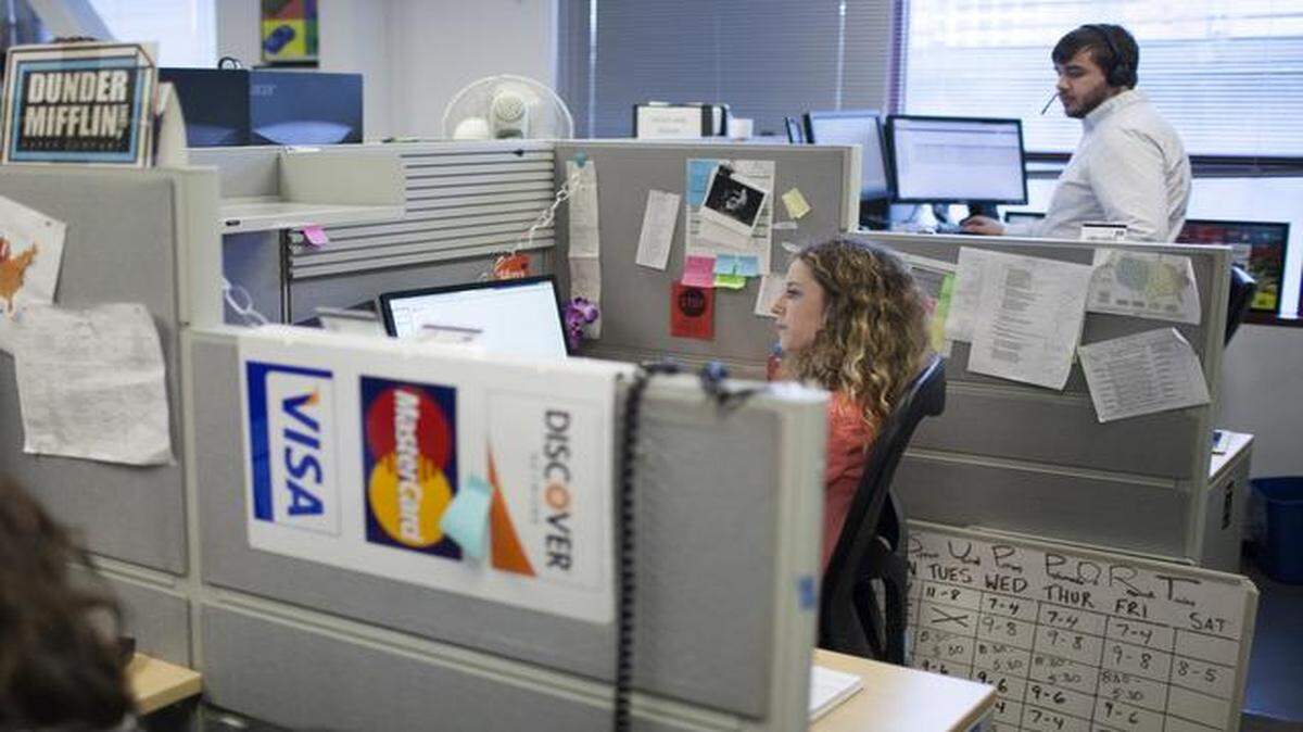 
Aryn Higgins worked Monday at her desk at Gravity Payments in Seattle. Dan Price, the founder of Gravity Payments, surprised his 120-person staff by announcing that he planned over the next three years to raise the salary of even the lowest-paid clerk, customer service rep and salesman to a minimum of $70,000 a year.
