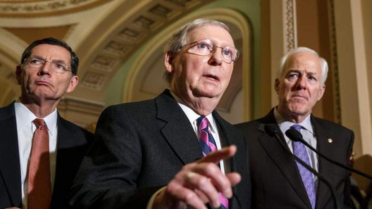 
Senate Majority Leader Mitch McConnell of Kentucky (center), Senate Minority Whip John Cornyn of Texas (right) and Sen. John Barrasso of Wyoming spoke with reporters Wednesday following their first GOP policy meeting since Congress reconvened.
