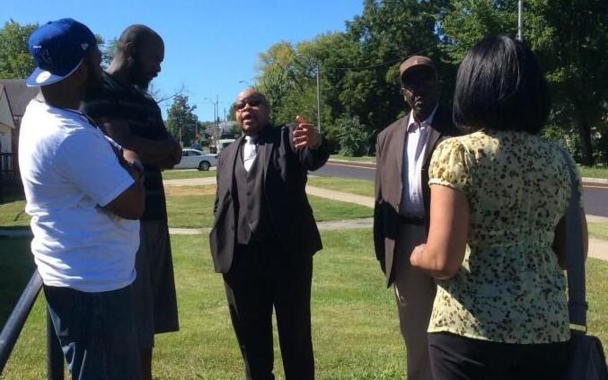 The Rev. Kevin D. Smith (center) is leading Urban Success Development Inc.’s effort to build affordable housing in the South Roundtop neighborhood of Kansas City.