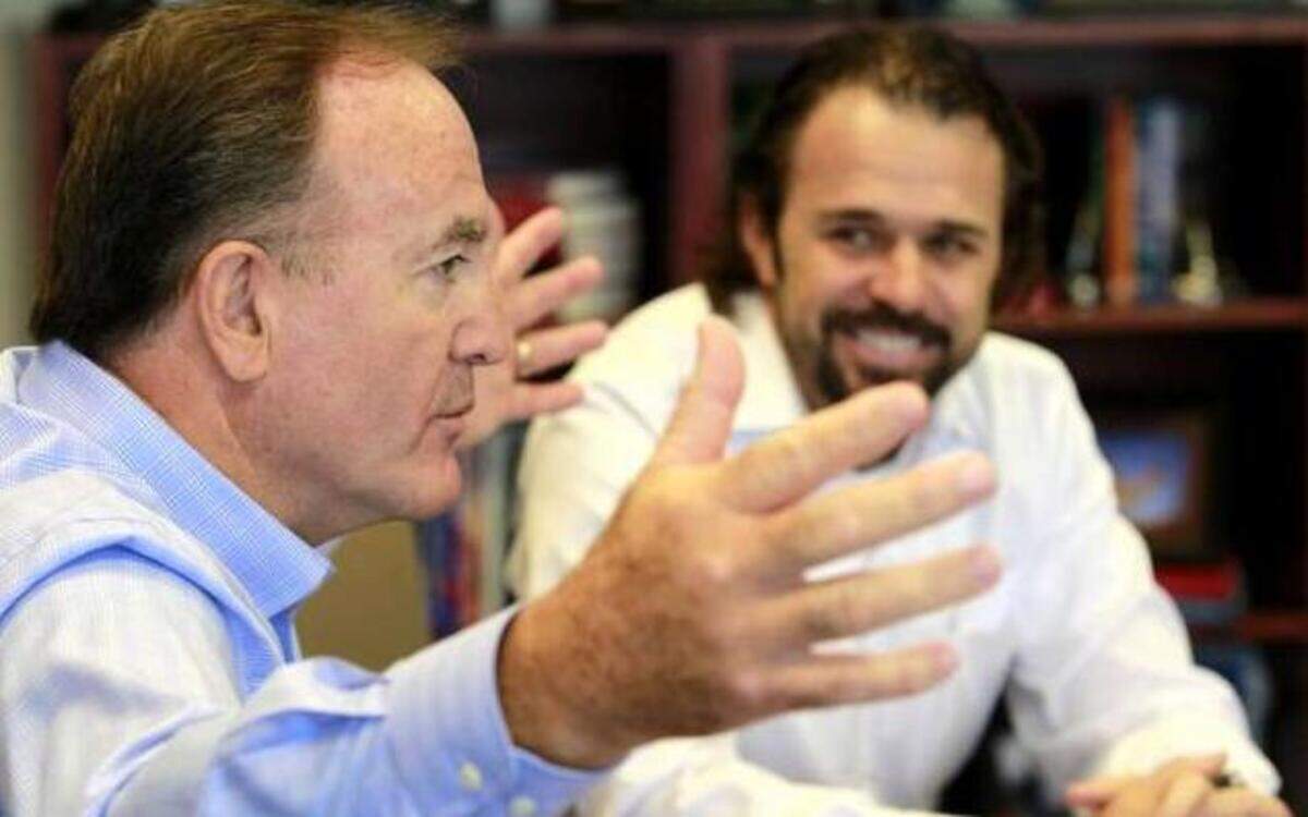 
YRC Worldwide executives James Welch, left, and Jamie Pierson, pictured during a 2013 interview, each received new employment agreements with the company last month.
