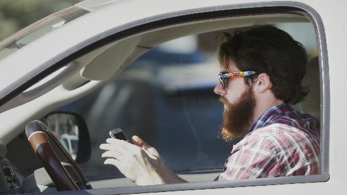 
Drivers say they’re not just texting, they’re on Facebook and Twitter, snapping selfies, reading email and doing video chats while behind the wheel.
