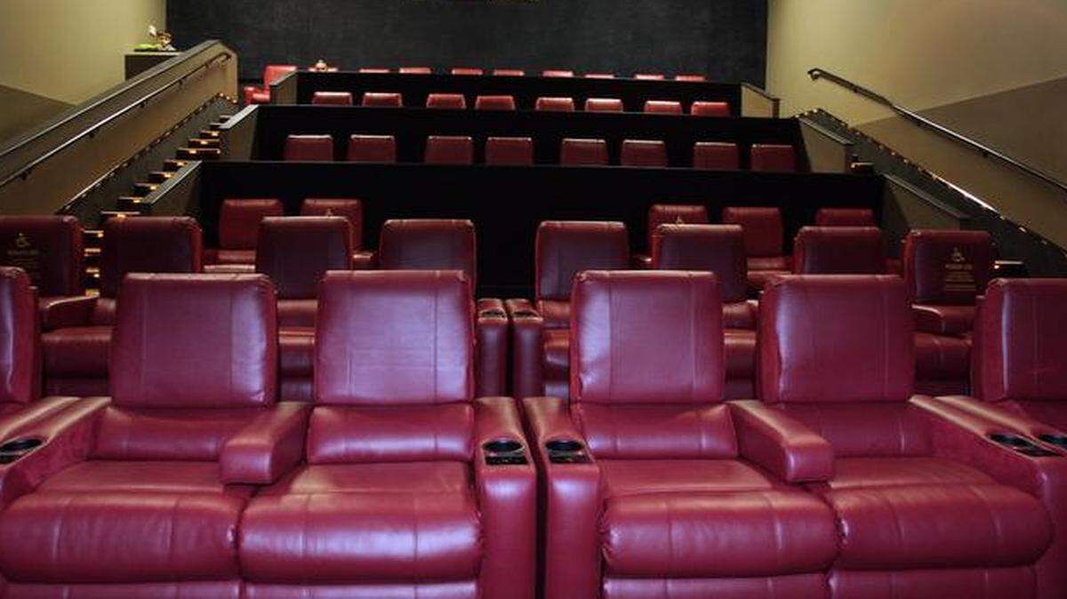
AMC chief executive Gerry Lopez has said reclining seats, such as these in the remodeled AMC Town Center 20 in Leawood, have proved popular with customers. The company plans to install more reclining seats at theaters this year.

