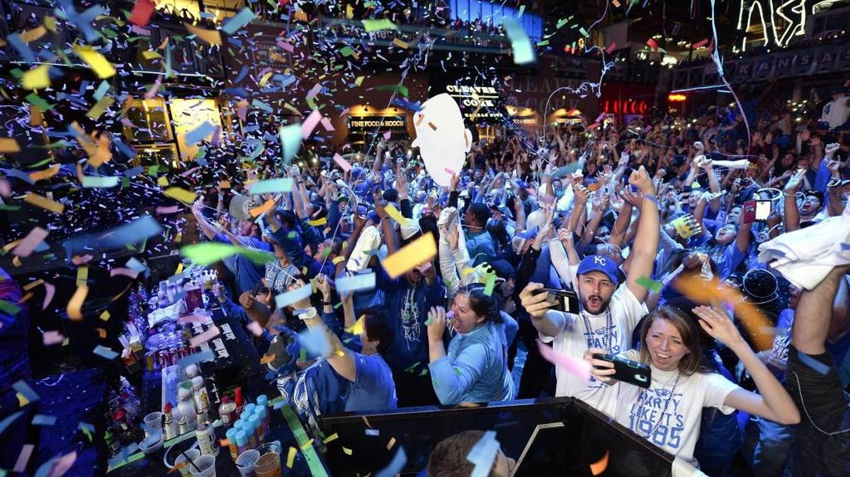 Confetti shot over the crowd as Royals fans celebrated the team's World Series victory early Monday, Nov. 2, 2015, in the Power & Light District. There will be no scene like that in Kansas City this year after the Royals missed the playoffs.