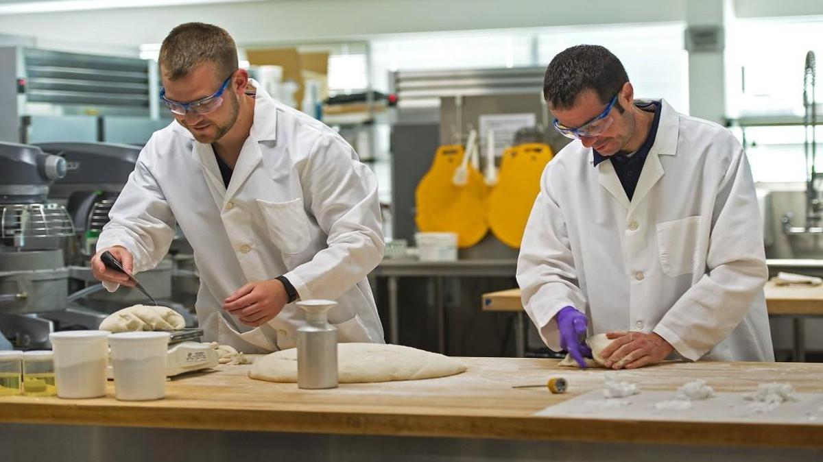 Food scientists Andrew Schoonover (left) and Daniel Morin prepared rounds of white bread dough for testing in the Innovation Center at Corbion’s North American Headquarters, 7905 Quivira Road, in Lenexa. Corbion plans to move 200 employees in the metro area into a new headquarters in Lenexa.