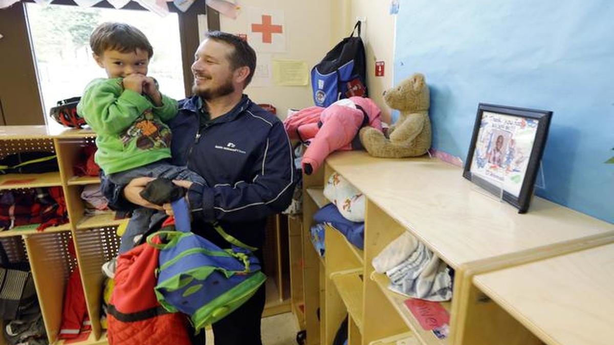 
Jason Prosser recently picked up his son Zachary, 3, from day care in SeaTac, Wash. Prosser and his wife are one of many middle-class couples struggling with accelerating costs for critical services such as health care and housing. At the same time, their income has been stagnant for the past three years. 
