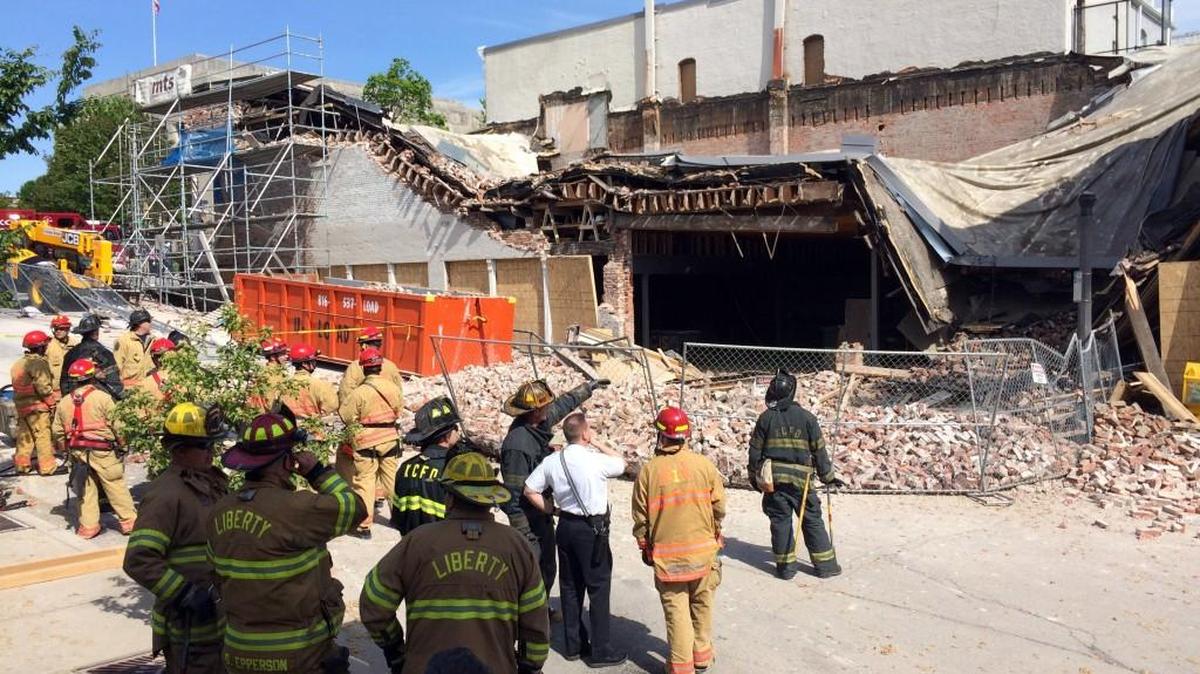 Structural engineers along with Liberty city, fire and police crews spent May 3 examining portions of an historic building in Liberty that had collapsed hours earlier. A rear portion of the Bedinger Building had collapsed.
