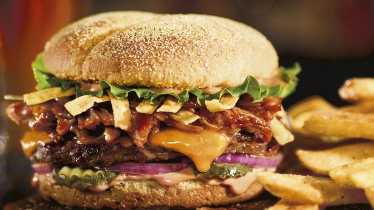 The BBQ Boss Hog at Red Robin Gourmet Burger has sweet and tangy barbecue pulled pork over an ancho-marinated beef patty, among other things.