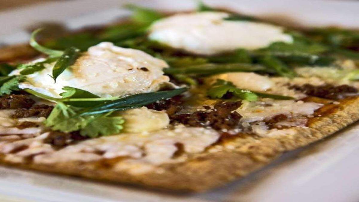 
The breakfast pizza flatbread from Louie’s Wine Dive.
