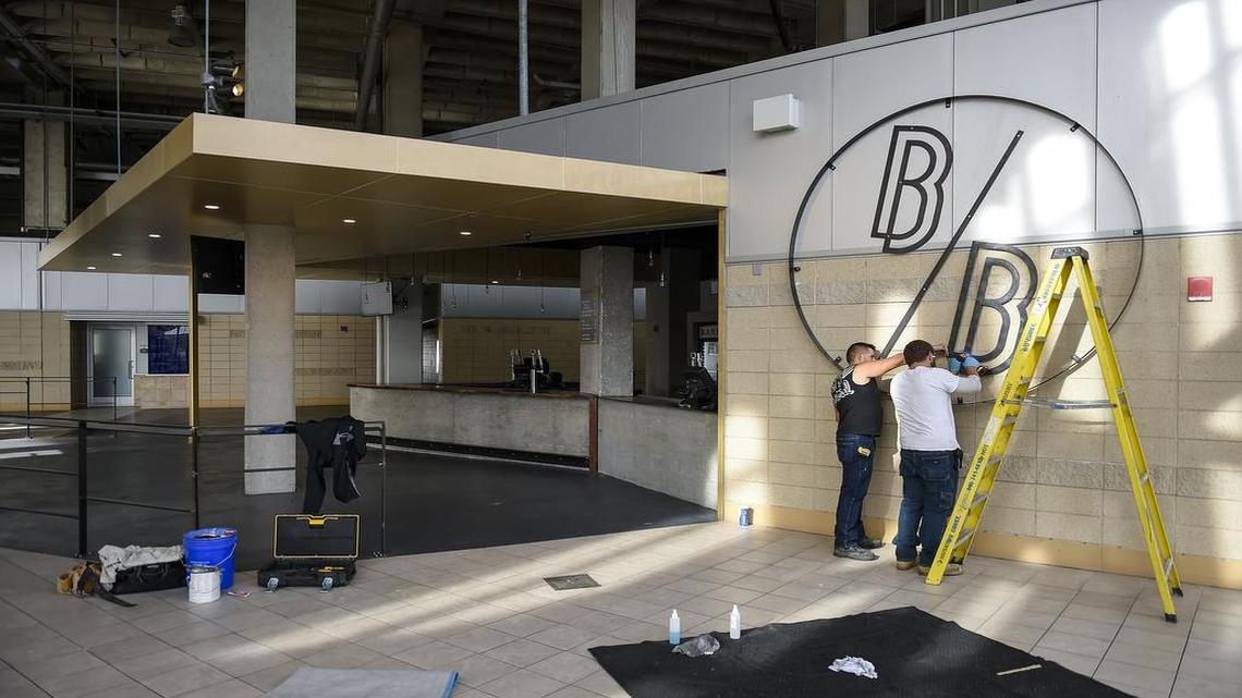 Ricardo Nevarez and William Wietz, both with Kamco Construction, attached metal lettering to the walls of Barrel Bar, a new bar inside Kauffman Stadium at section 320 serving premium spirits, mixed drinks and beer. The bar was open for the ALCS but is now getting the finishing touches before Tuesday’s World Series game against the New York Mets.