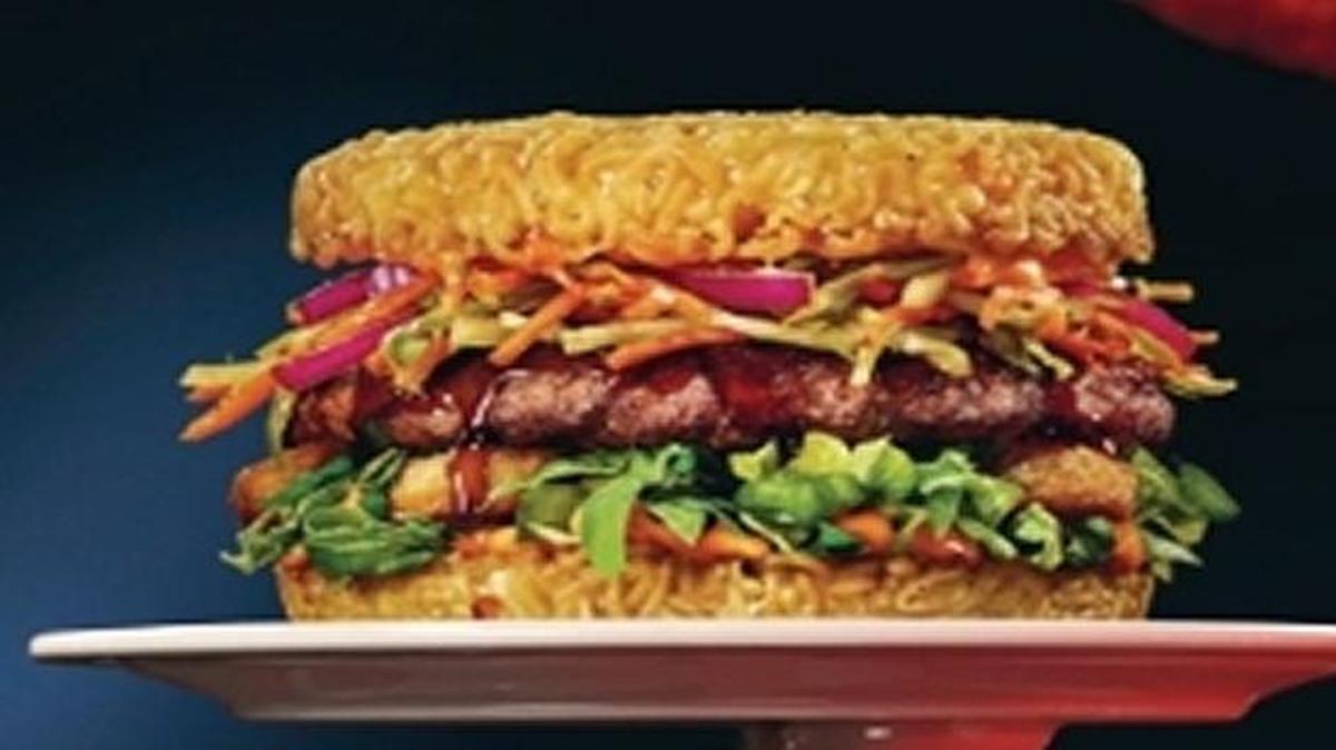 Ramen Burger on a seasoned ramen bun.