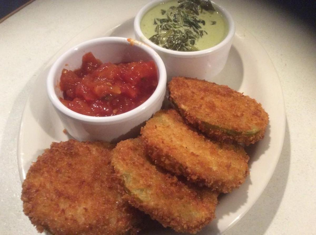 Brookside Poultry Co.’s fried green tomatoes with creamed spinach and tomato chutney.