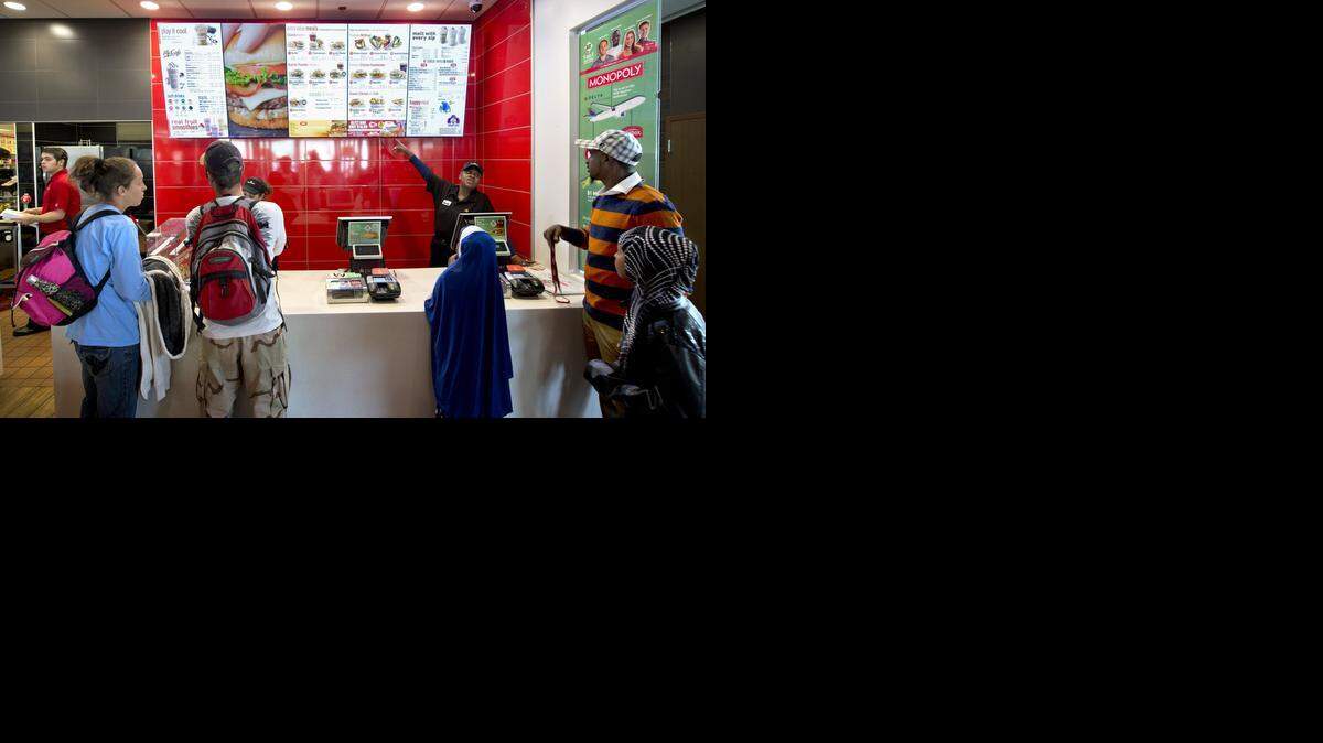 The McDonald’s in North Kansas City was demolished and a new one built in its place at 2200 Vernon. Last week, Wanda Washington (right, behind counter) waited on customers.