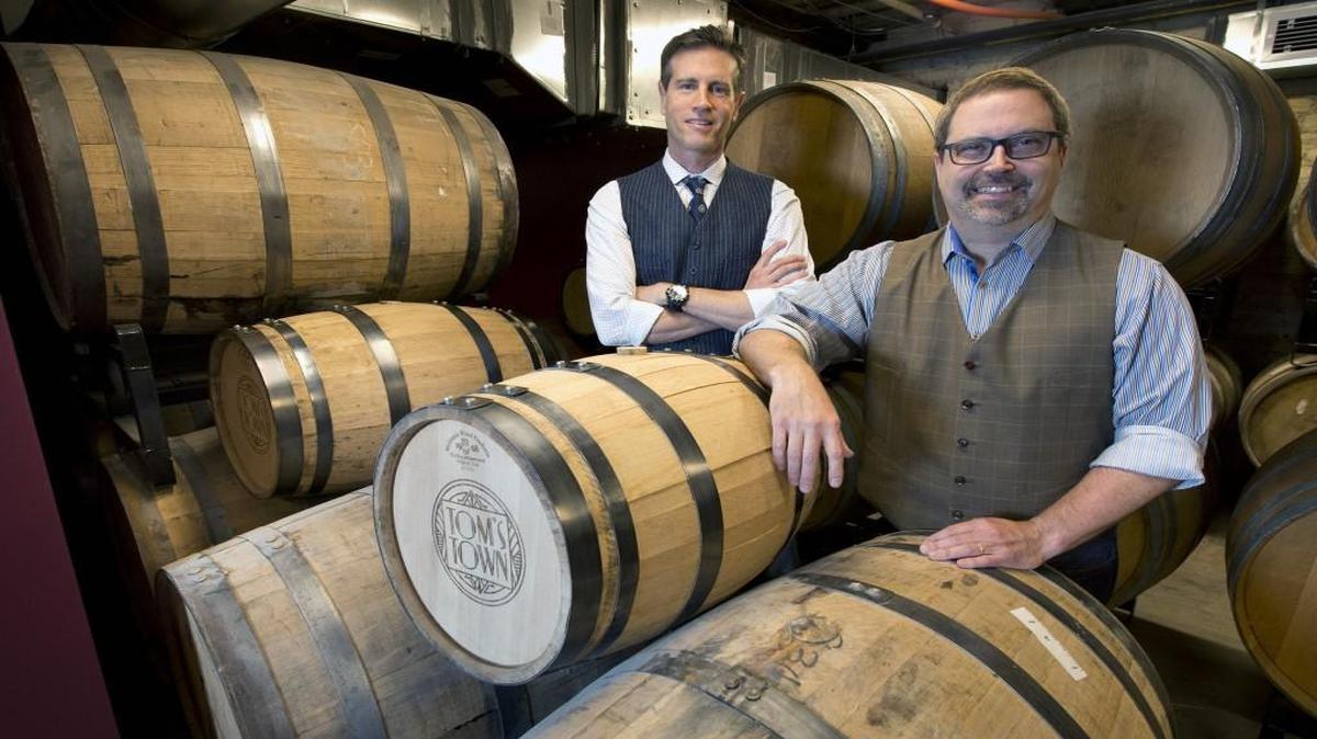 David Epstein (left) and Steve Revare at Tom’s Town agreed to 14 conditions to get a liquor license.