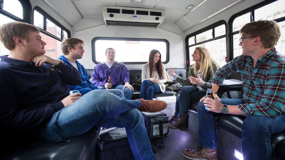 Friends enjoyed a recent tour of Kansas City breweries on the Barley Bus, which has perimeter seating to make it more casual and friendly.