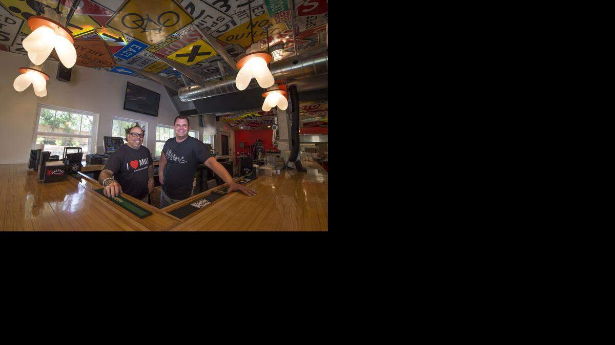 
Stretch and his manager, Dave McMullin, are ready to open Grinders Stonewall in Lenexa next week.
