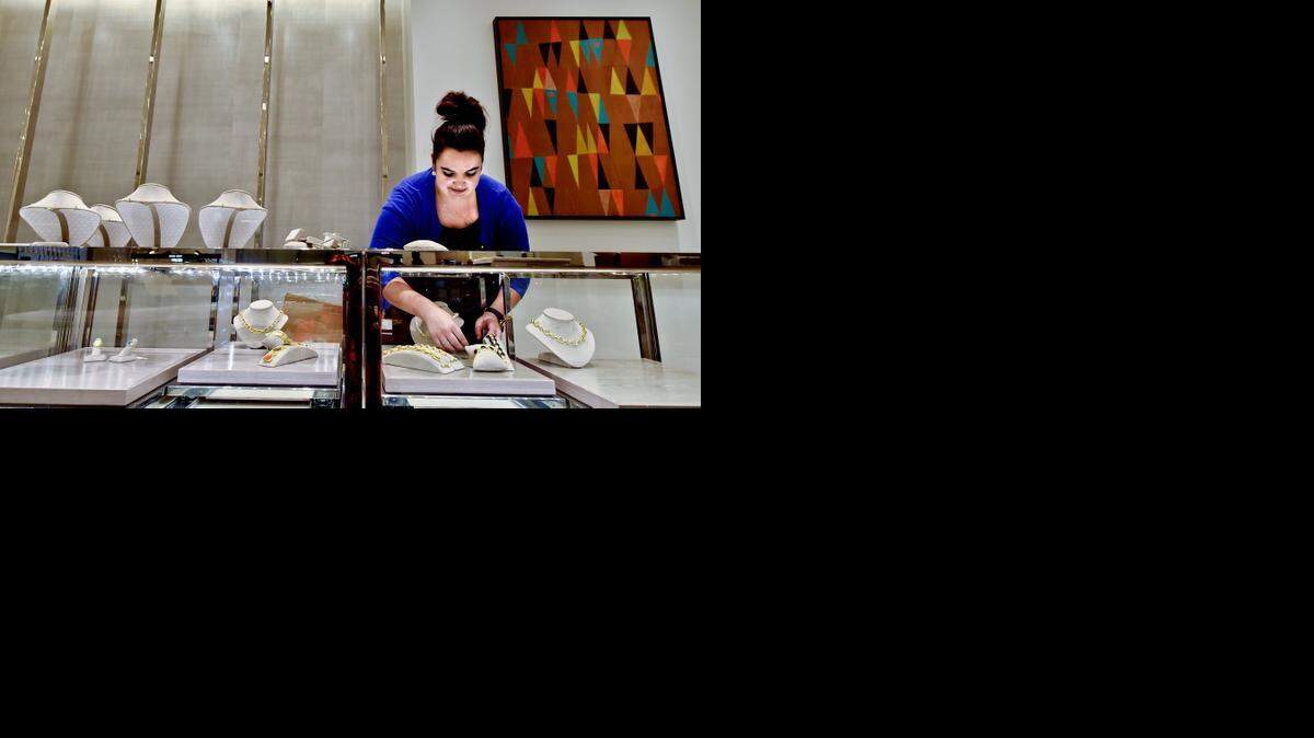 
Bethany Murray displays Elizabeth Locke fine jewelry in the new Halls on Grand.
