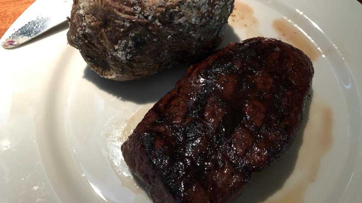 Charleston’s top sirloin with baked potato.